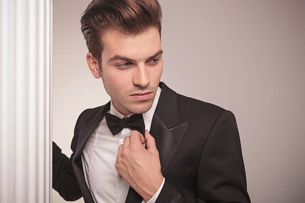 istock handsome business man looking away 586387624