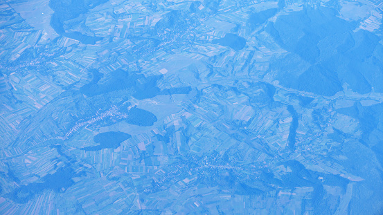 Aerial shot of landscape and agricultured area of Carpatians in Romania.