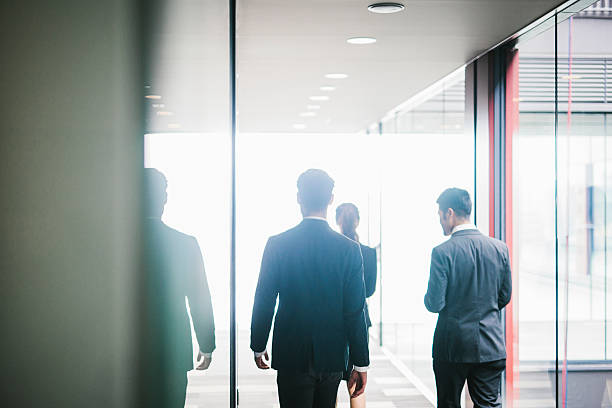 istock Three Collegues Meet in the Office 586390316