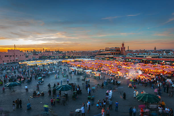 istock Evening Djemaa El Fna Square with Koutoubia Mosque, Marrakech, Morocco 586393782