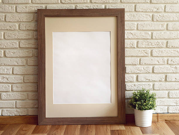 empty Picture Frame and flowers in a pot