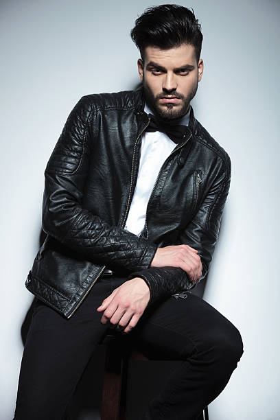 istock handsome young business man resting on a stoo 586693180