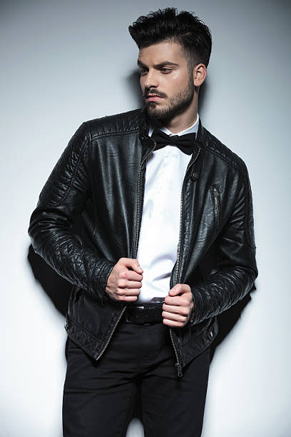 istock Attractive young business man looking to his side 586693744