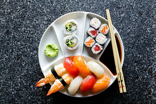 istock sushi Plate with Sushi Set nigiri and sushi rolls , maki 586693932