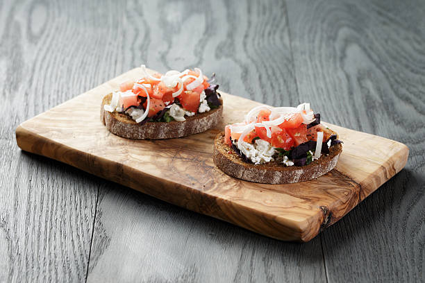 istock rye sandwich or bruschetta with ricotta, herbs and tomato 586693944