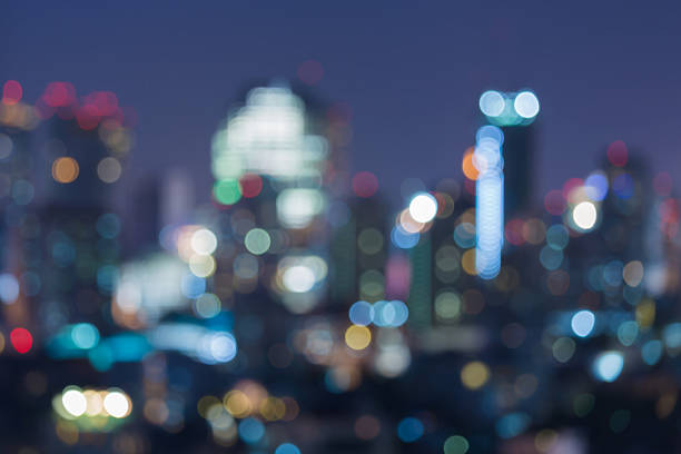 istock Blurred lights night view city downtown 586694184
