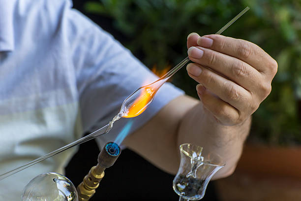 istock Shaping a piece of glass 586694912