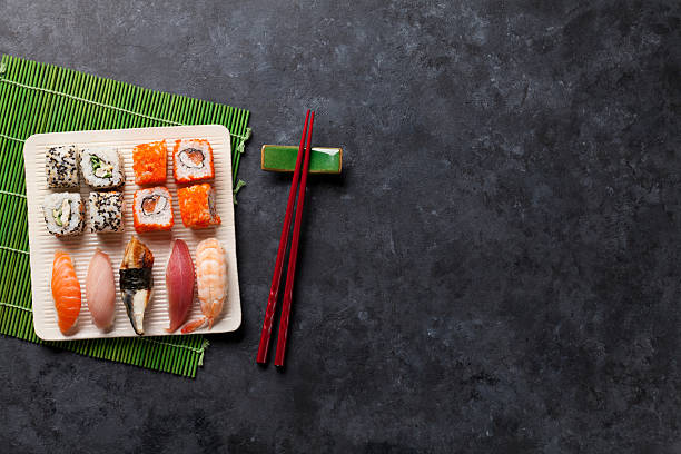 istock Set of sushi and maki roll 586695376