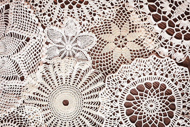 Beautiful delicate vintage lace background Beautiful delicate vintage lace background of crochet napkins on the table close up crochet photos stock pictures, royalty-free photos & images