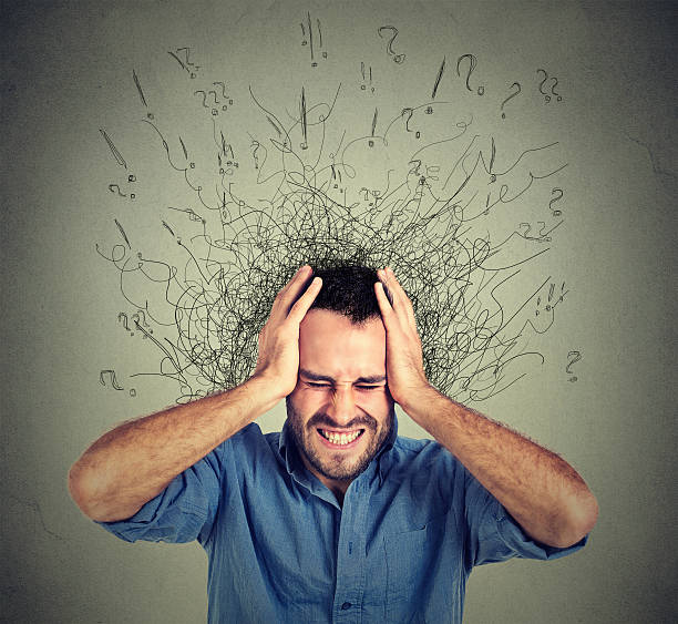Stressed man has many thoughts brain melting into lines stock photo