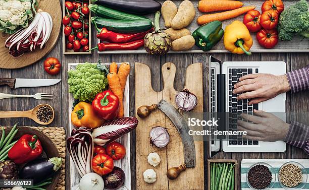 Cooking Meets Technology Stock Photo - Download Image Now - Food, Laptop, Searching