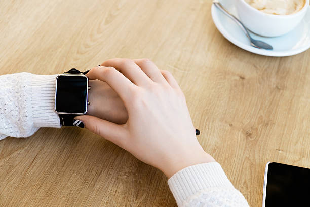 istock Cup of coffee, watch and mobile phone 586697486