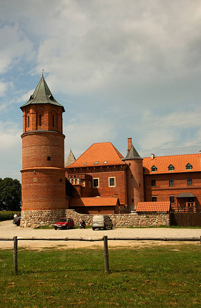 Tykocin,Poland - July 26, 2016: View of the tower and a fragment of a Gothic castle near the Tykocin, Poland, during the summer. Editorial.Verticall view