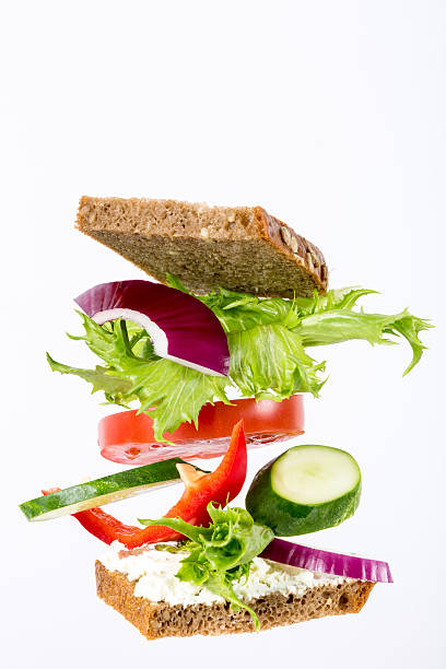 istock Delicious sandwich ingredients fall between the bread 586699918