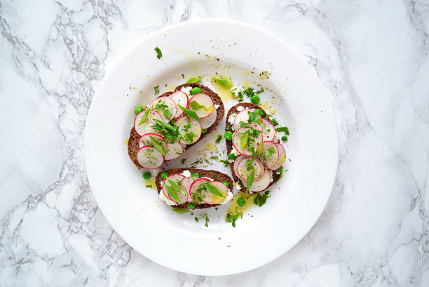 istock toast with ricotta, radish and green peas 586700392