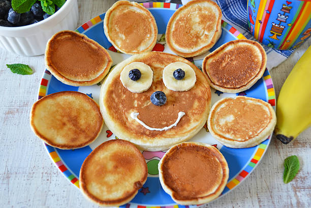 istock Sun for breakfast of pancakes with bananas and blueberries 586700910