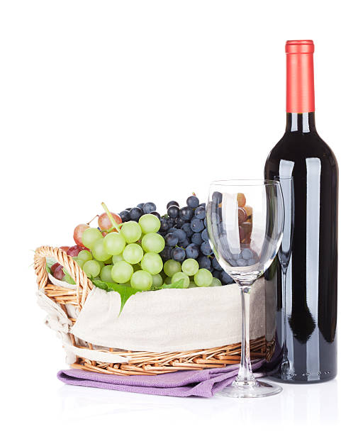 istock Red wine bottle, glass and grapes 586701048