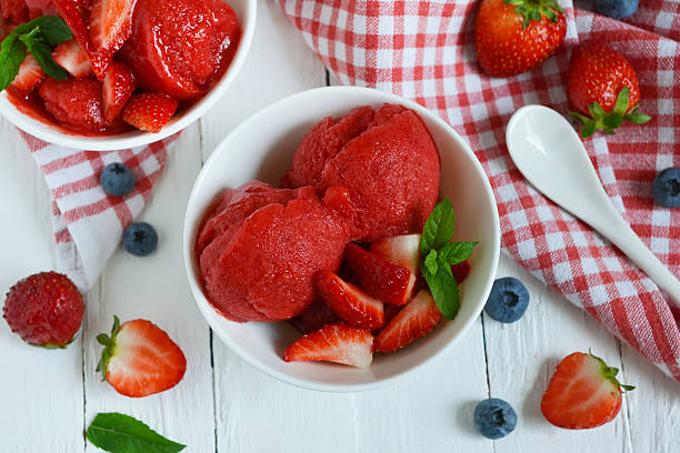 Cold, bright strawberry sorbet, berry ice cream stock photo