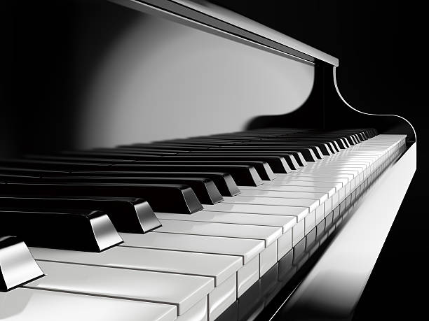 klaviertasten auf schwarz piano - klavier stock-fotos und bilder