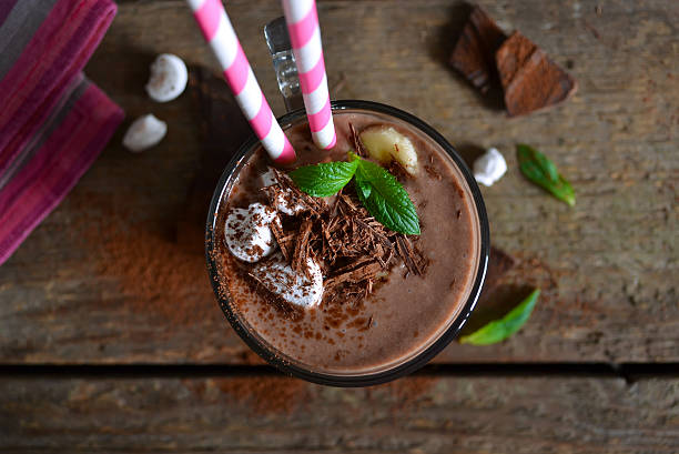 istock chocolate smoothie with oats and marshmallow on a wooden backgro 586701786