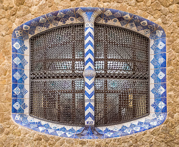 Barcelona, Spain - July 3, 2016: Details of building in the Parc Guell - public garden in Barcelona, designed and built by Guadi and Josep Jujol in 1914.