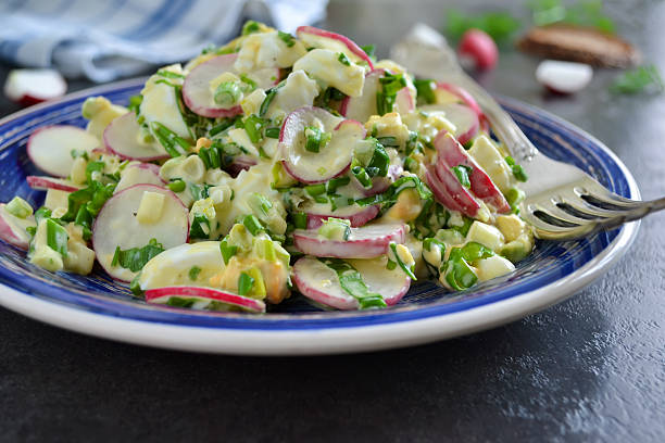 istock salad with radish, egg and wild garlic 586702582