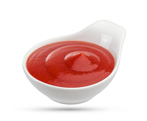 istock Tomato sauce in white bowl 586704642