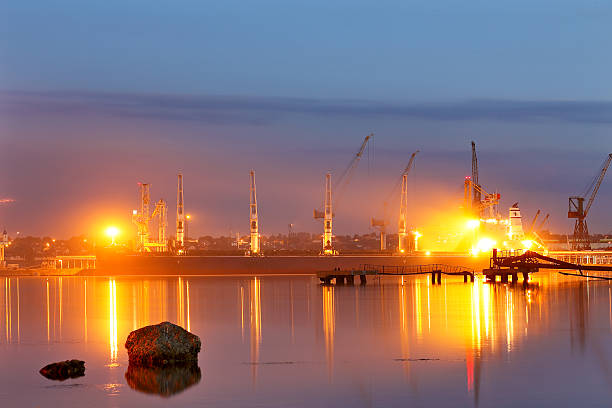 istock Tanker in the port. Harbor at night 586704708