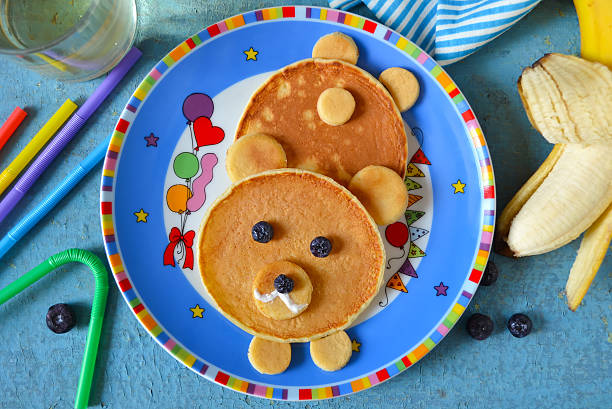 istock Bear from pancakes for breakfast to children 586704876