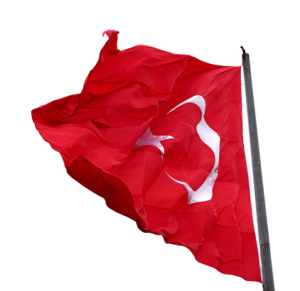 Turkish flag waving in windy day. Isolated on white background.