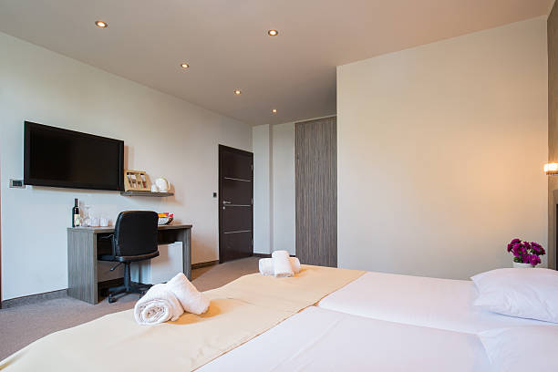 istock Modern beautiful hotel bedroom interior 586707192