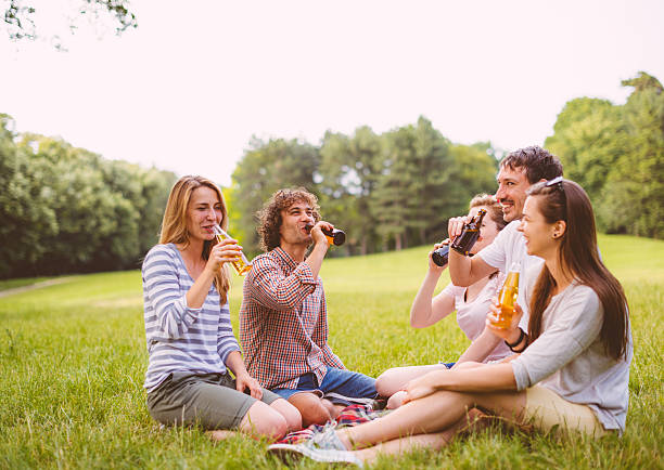 istock Toast in nature between cheerful friends. 586707286