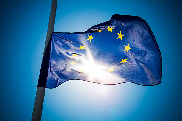 istock Europe flag against strong sunshine 586708646