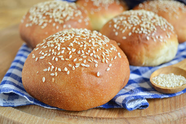 istock homemade buns with sesame seeds and milk for breakfast 586709062