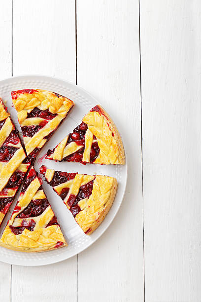 istock Homemade berry pie with cherries and raspberries 586709510