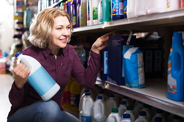 istock Woman choosing detergent in shop 586710196