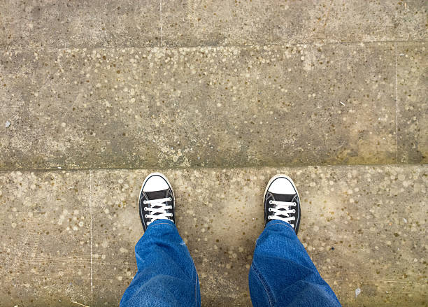 istock Feet on the stairs. 586710754