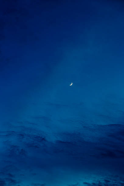 Moon and blue sky in the night stock photo