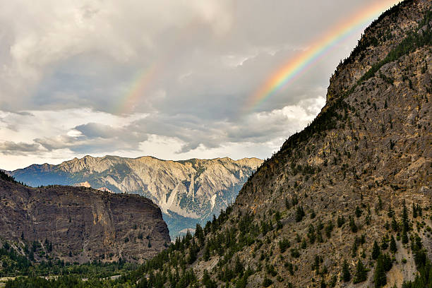 Rainbow over the mountains in Lillooet, British Columbia, Canada.