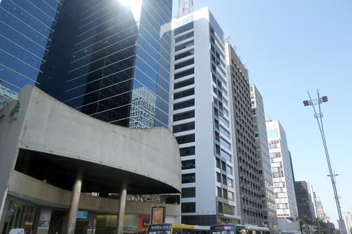 Sao Paulo, Brazil - July 30, 2016: View of Paulista Avenue with skyscrapers and entrance of Center 3 mall in the city's main avenue.
