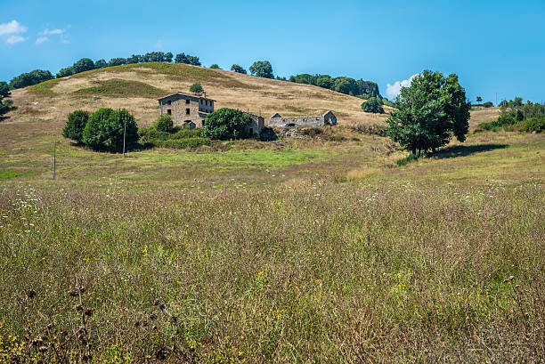 istock Abandoned farm house on a hill 586715012
