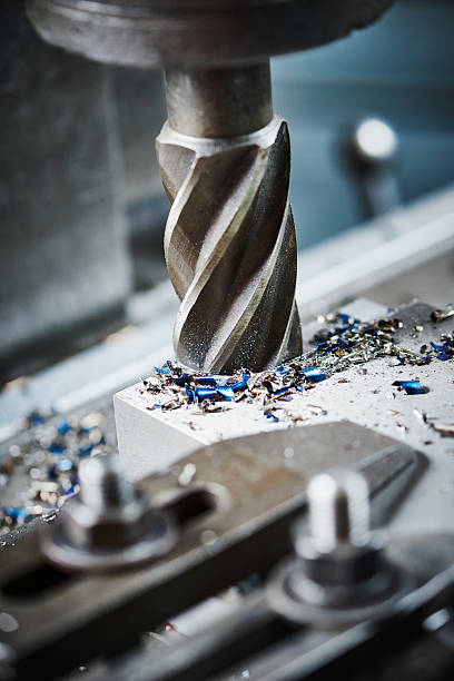 istock industrial metalworking cutting process by milling cutter 586715488
