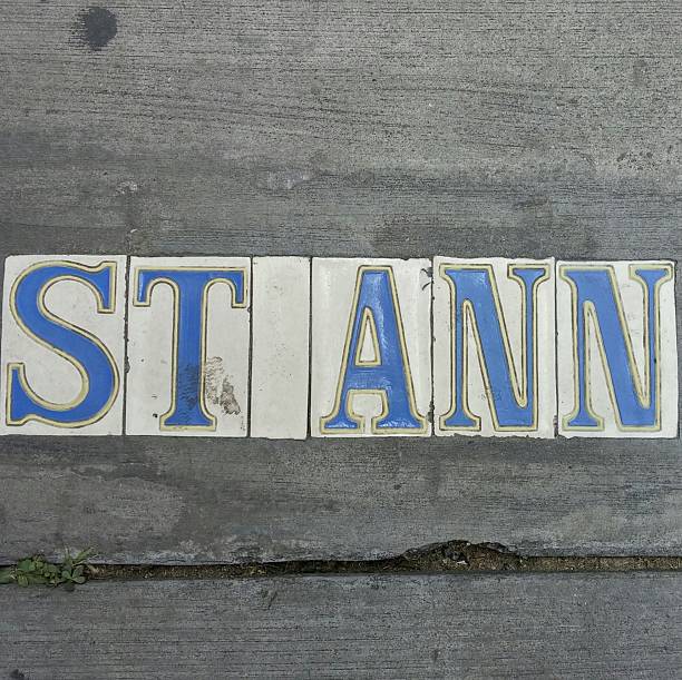 istock Saint Ann New Orleans Ceramic Tile Street Name on Sidewalk 586722342