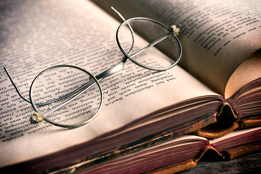 Antique books and spectacles