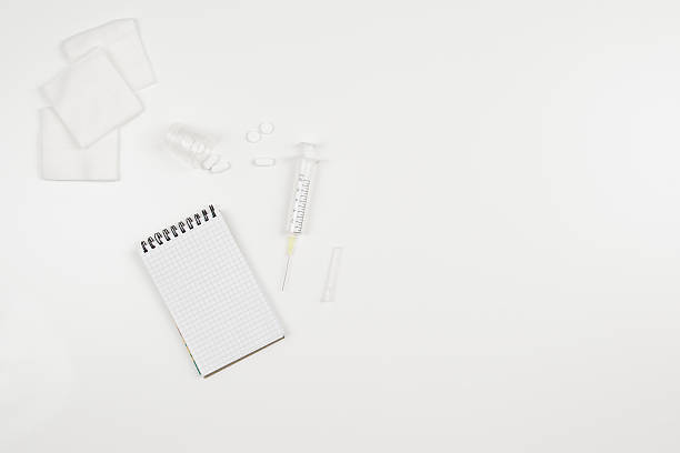 istock Top view of modern, sterile doctors office desk background 586727196