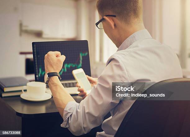 Businessman Trader Working In The Office Stock Photo - Download Image Now - Stock Market and Exchange, Currency Exchange, Trading