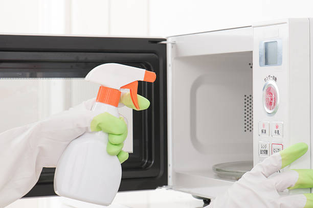 istock Cleaning of the microwave oven 586734332