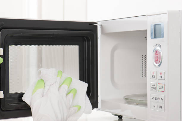 istock Cleaning of the microwave oven 586734438