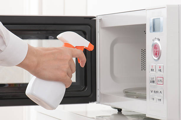 istock Cleaning of the microwave oven 586734628