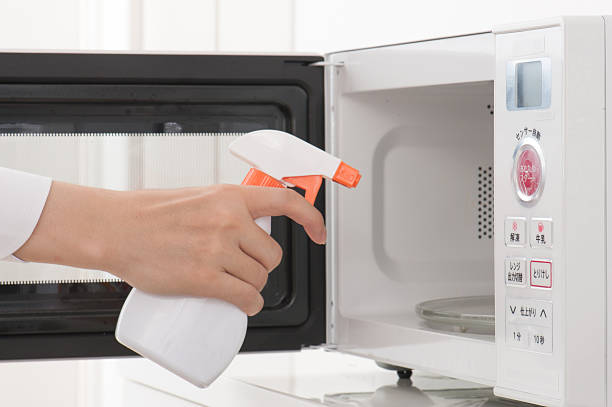 istock Cleaning of the microwave oven 586734648
